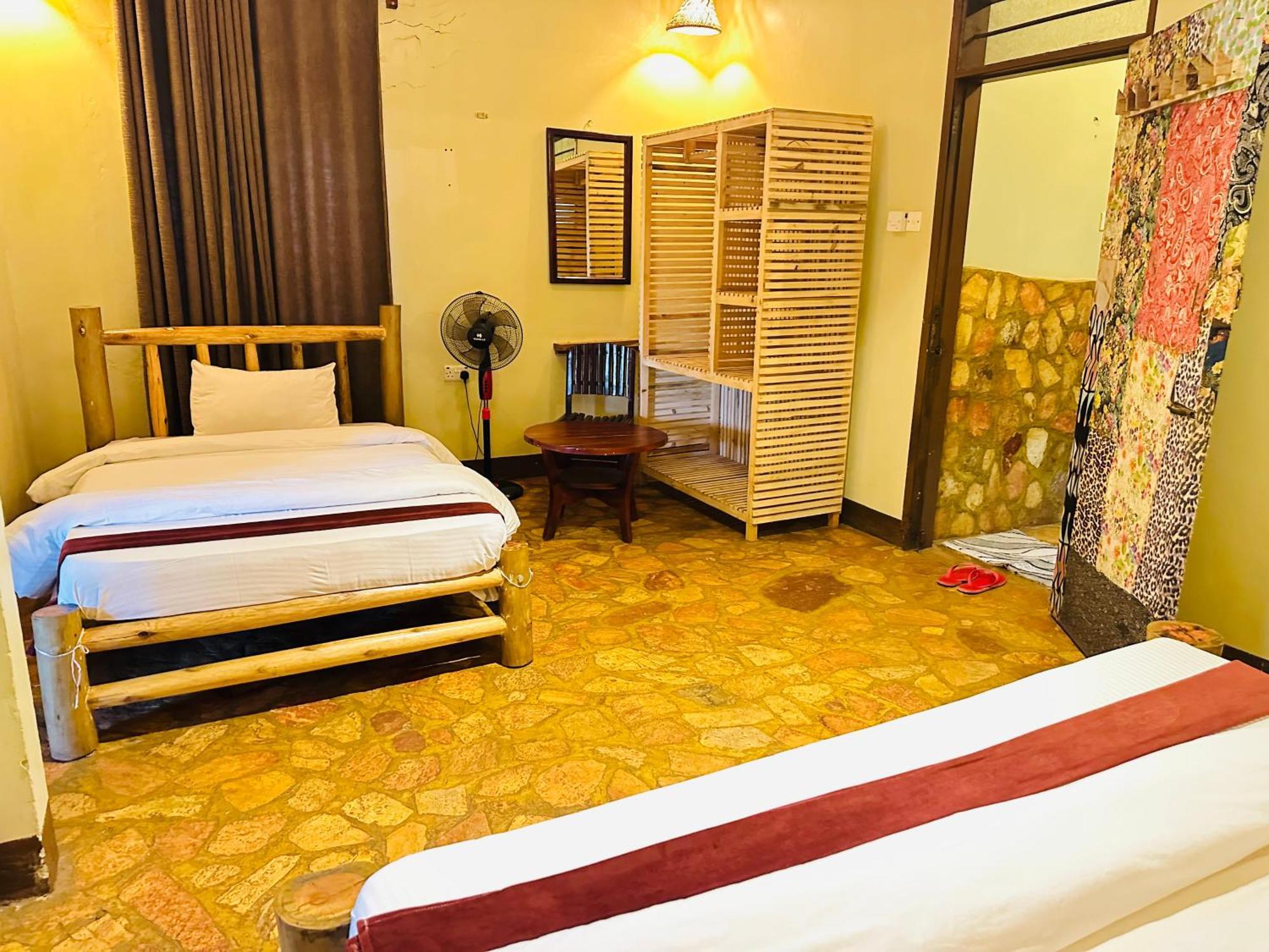 Afro Smile Hotel & Guest House Jinja Esterno foto