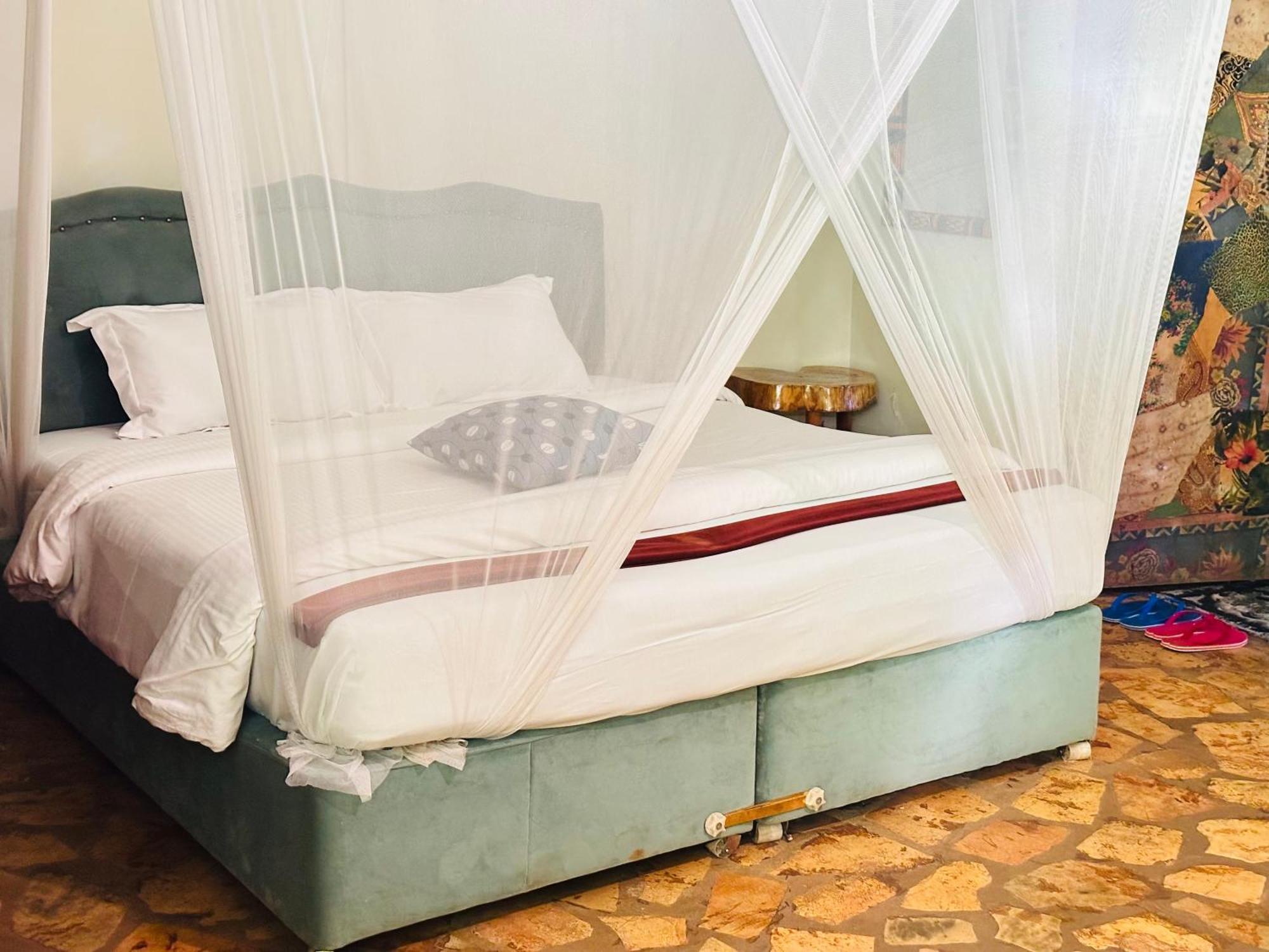 Afro Smile Hotel & Guest House Jinja Esterno foto