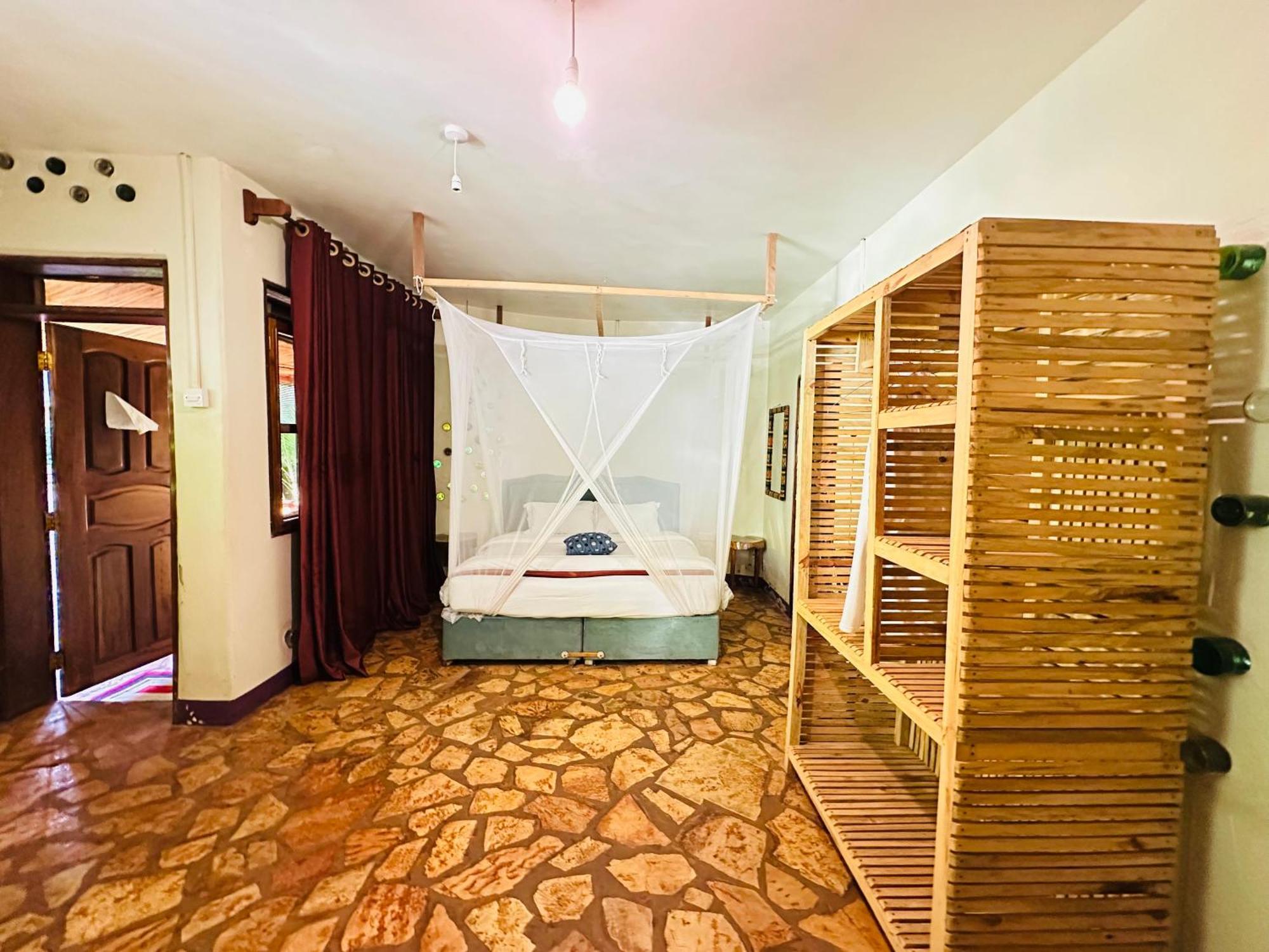 Afro Smile Hotel & Guest House Jinja Esterno foto